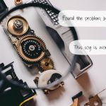 A magnifying glass looking at tiny gears in a machine, with a caption saying "Found the problem, Boss. This cog is working perfectly."